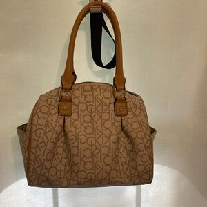 Calvin Klein women’s bag lightly use stains inside